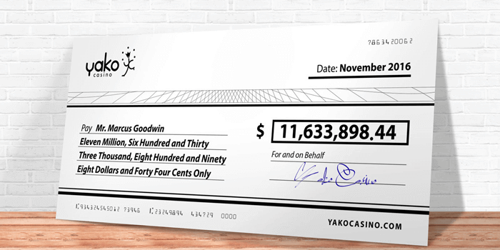 Yako Casino player presented with Mega Moolah jackpot cheque